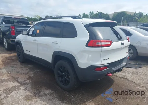 2015 Jeep Cherokee Trailhawk from USA, damaged, VIN 1C4PJMBS9FW705080